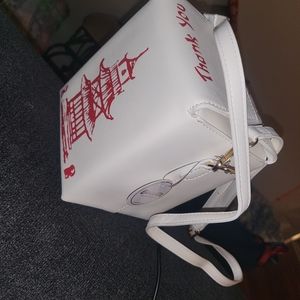 To go take out purse brand new with tag